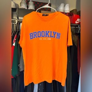 Orange “Brooklyn, NYC” printed tee